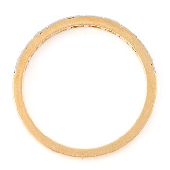 18K gold half-eternity ring with octagonal-cut diamonds.