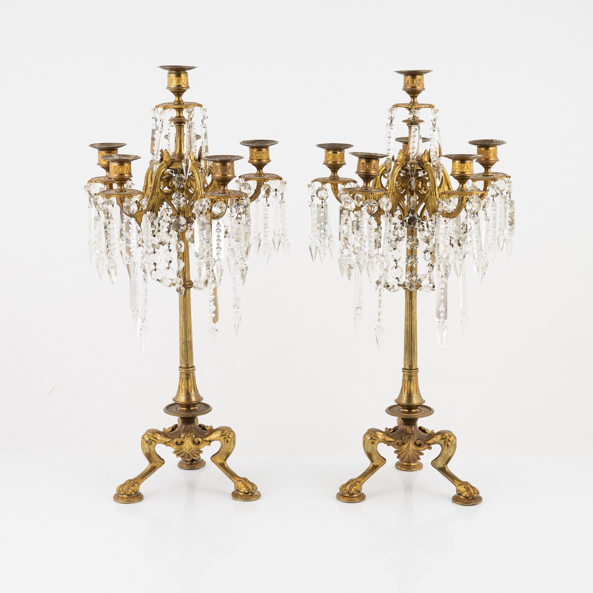A pair of bronze candelabra, late 19th Century.