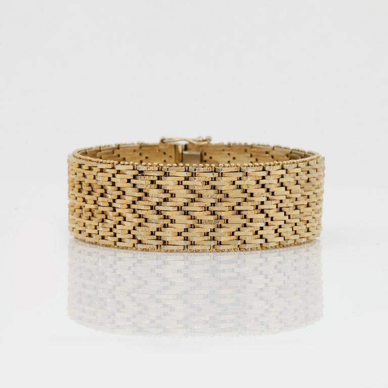 ARMBAND, guld 18K, 1900-talets andra hälft. Vikt ca 63 gram.