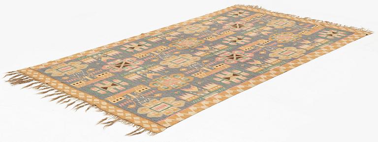 A flat weave and tapestry weave drape, approximately 254 x 145,5 cm, by Johanna Brunsson's Weaving school.