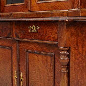 A display cabinet, late 19th century.