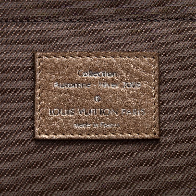 Louis Vuitton, a shimmer 'Halo' bag.