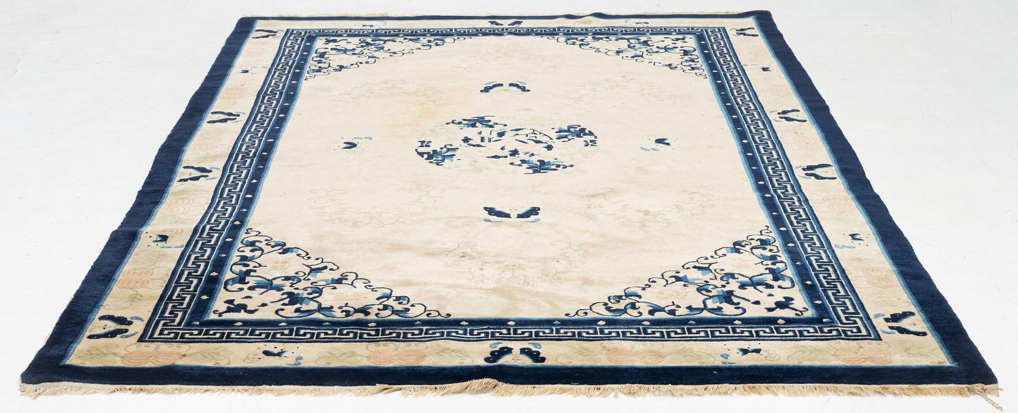 A carpet, old, China (antique finish), c. 276 x 189 cm.