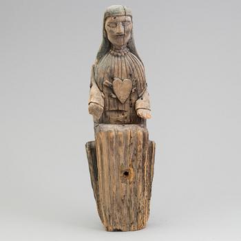 A wooden 19th century sculpture.