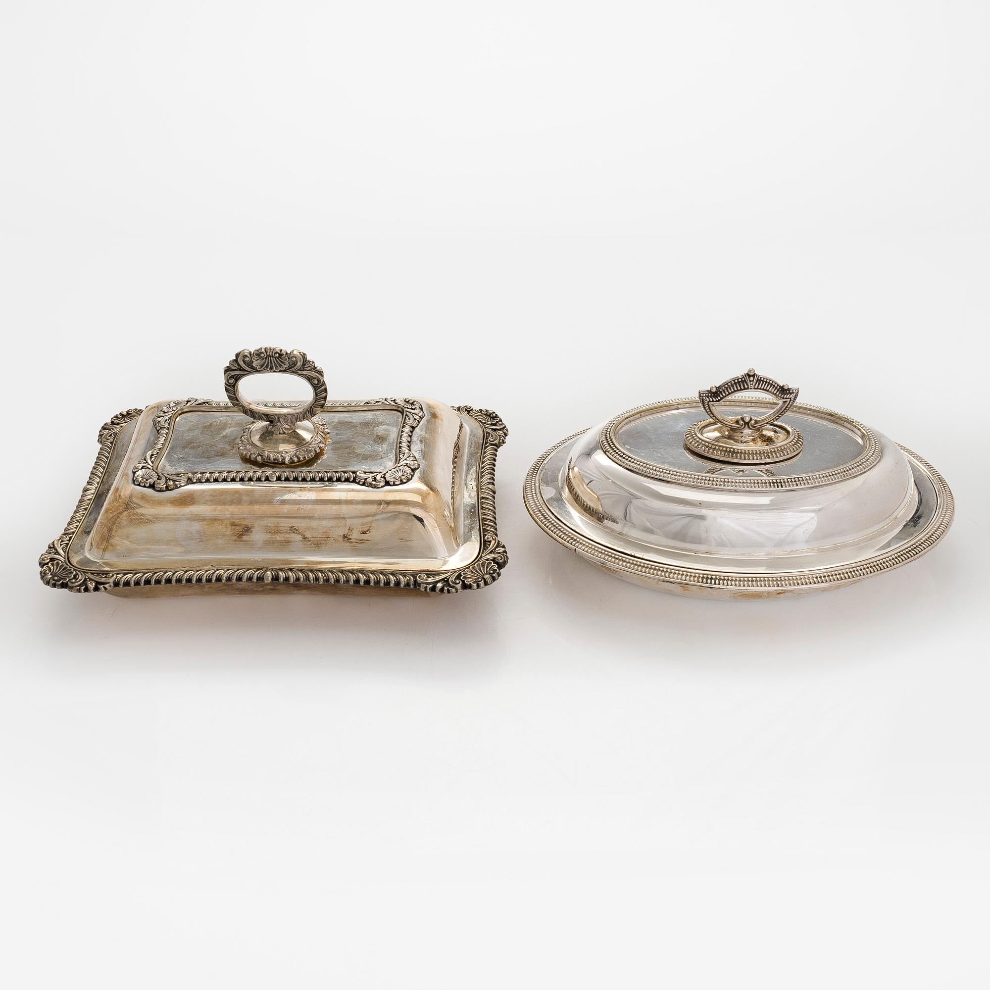 A set of four silver plated entree dishes, England.