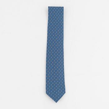 Hermès, a silk tie and two pocket squares.