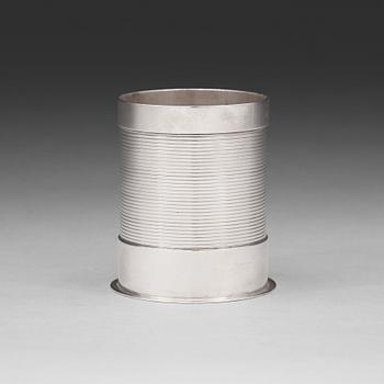 Sigvard Bernadotte, A Sigvard Bernadotte sterling bottle holder (for beer bottle), Georg Jensen, Copenhagen 1925-32.