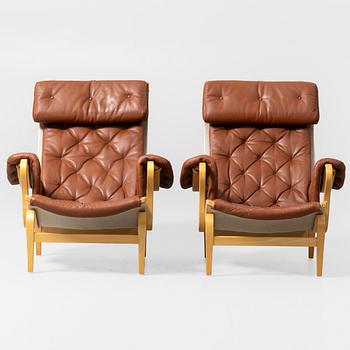 Bruno Mathsson, Armchairs, a pair, "Pernilla", DUX, second half of the 20th century.