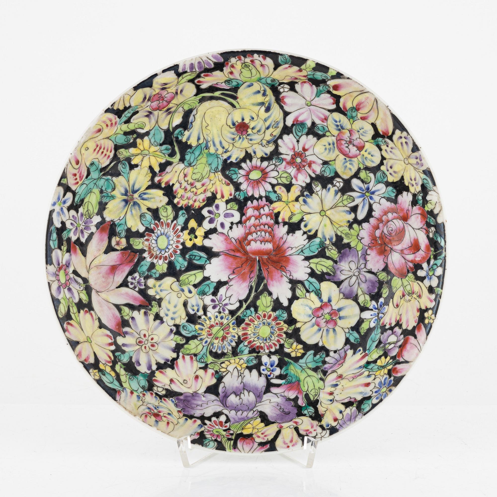 A Chinese famille rose mille fleur dish, 20th Century with Guangxu mark.