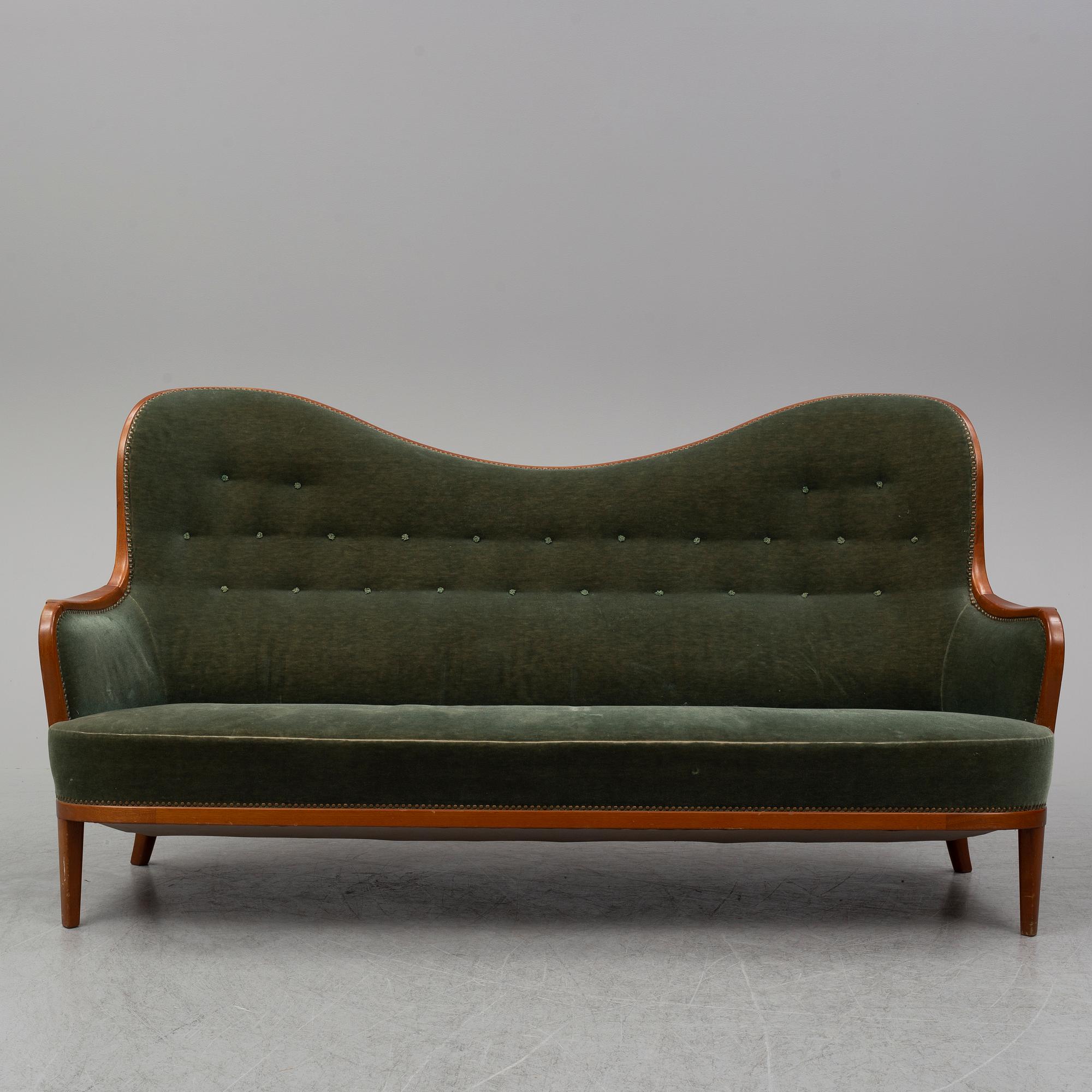 CARL MALMSTEN, an 'Advokaten' mahogany sofa.