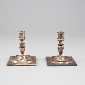 A pair of 19th century silver candlesticks.