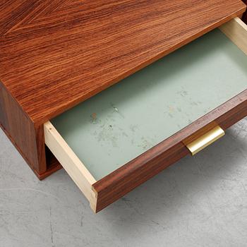 A pair of rosewood veneered coffee tables, 1960's/70's.