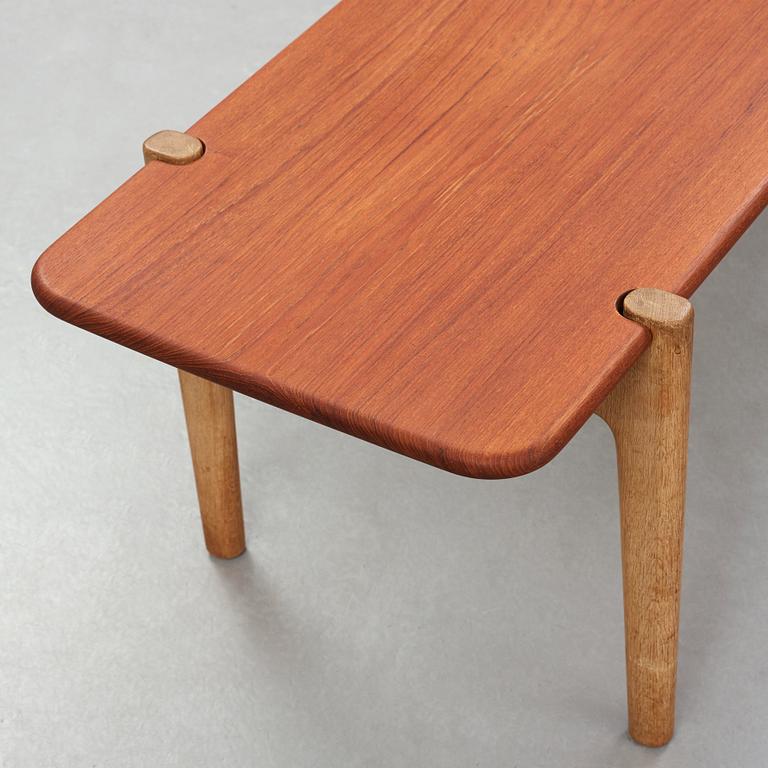 Hans J. Wegner, a solid teak and oak bench/ table, Johannes Hansen, Denmark, 1950-60's.