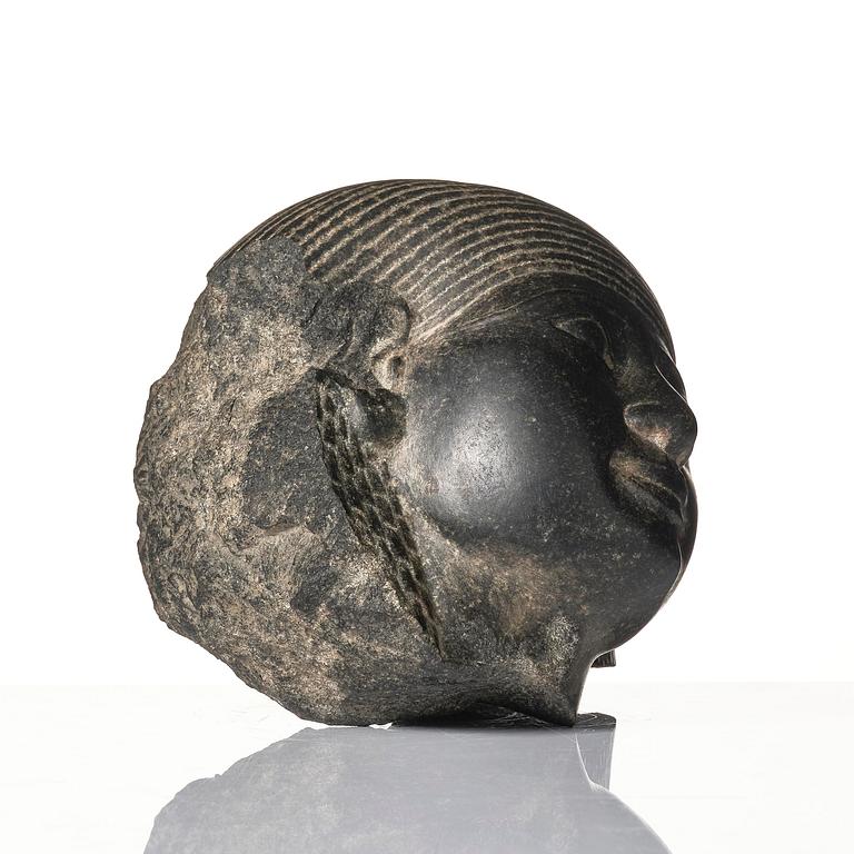 An Egyptian basalt head of a man, Grand tour, 19th century.