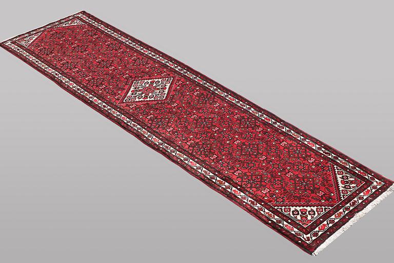 A runner carpet, Hosseinabad, ca 393 x 82 cm.