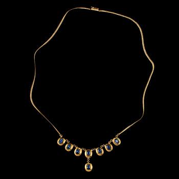 COLLIER, 18k guld med 8 fasettslipade blå safirer, 1900-talets slut. Vikt 14 g.