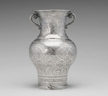 233. A  persian silver two handled vase from the late Qajardynasty.