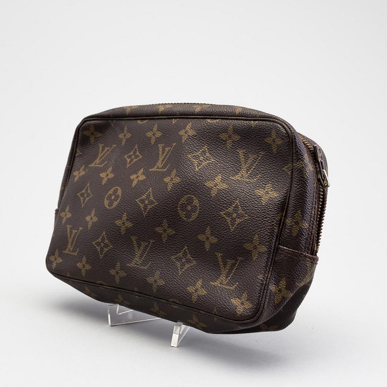 A Louis Vuitton toiletry bag.