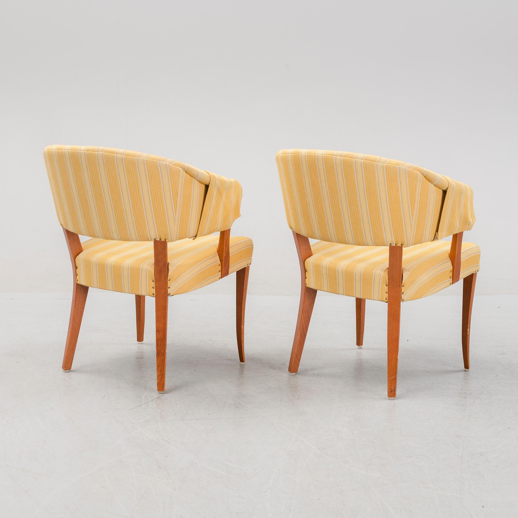 Carl Malmsten, a pair of 'Lata Greven' easy chairs, OH Sjögren, and a 'Berg' table, second half of the 20th Century.