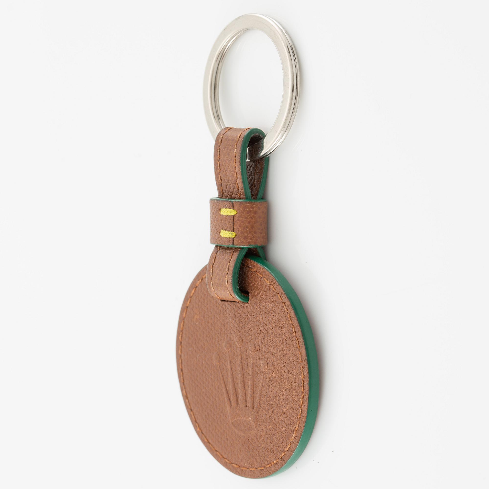 Rolex, key ring, "No Reserve", 59 x 120 mm.