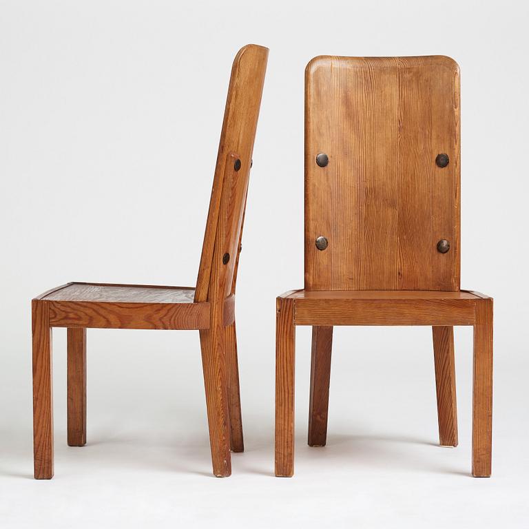 Axel Einar Hjorth, a pair of stained pine "Lovö" chairs, Nordiska Kompaniet, Sweden 1930's.