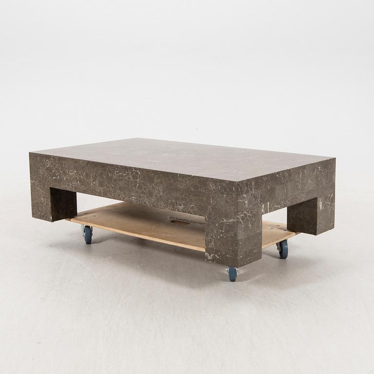 A late 20th century travertine coffee table.
