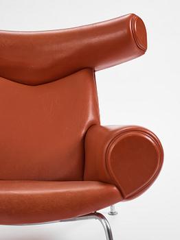 Hans J. Wegner, a brown leather  'Ox Chair', probably executed by AP-stolen, Denmark, 1960's-70's Provenance Sven Lundh.