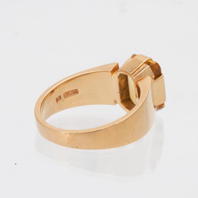 An 18K gold ring set with a step-cut citrine by Axel Svensson Malmö 1979.