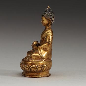 A gilt bronze figure of Buddha Bhaisajyaguru, Qing dynasty (1644-1911).