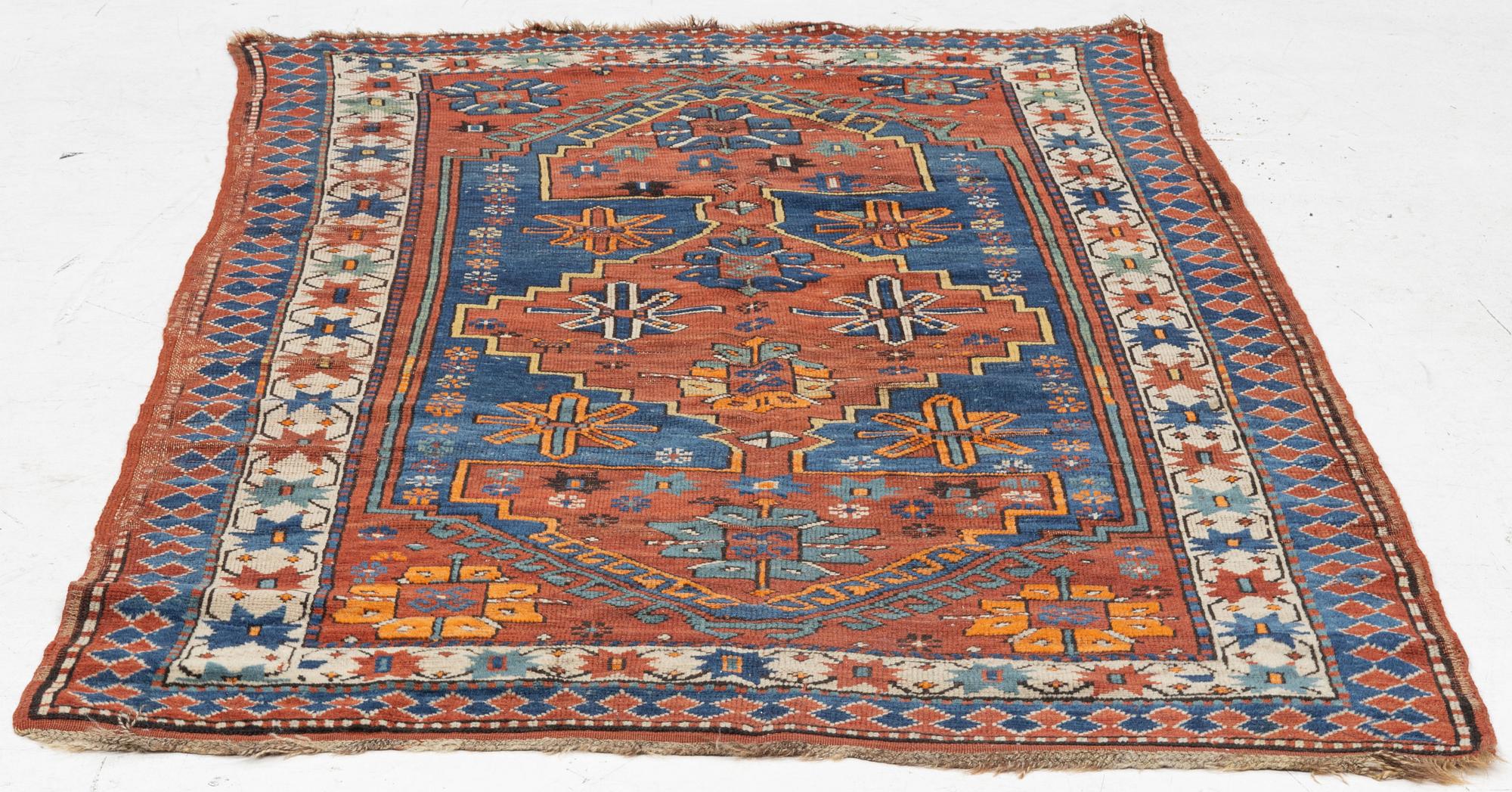 An antique Kazak rug, southern Caucasus, c 168 x 103 cm.