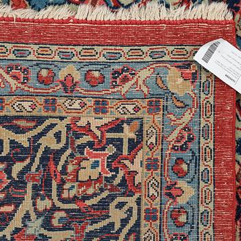 A carpet, a semi-antique/an old Persian, probably a Qazvin, ca 345-349 x 251,5-253 cm.