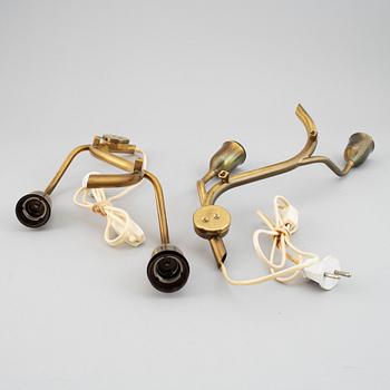A pair of Astra brass wall lamps, mid 20th century.