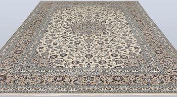 A Keshan carpet, approx. 355 x 250 cm.