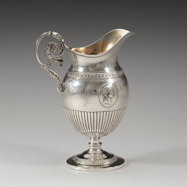 A Swedish 19th century parcel-gilt cream-jug, marks of Magnus Fryberg, Jönköping 1825.