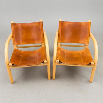 A pair of 1980s ' 411' armchairs for Artek, Finland.