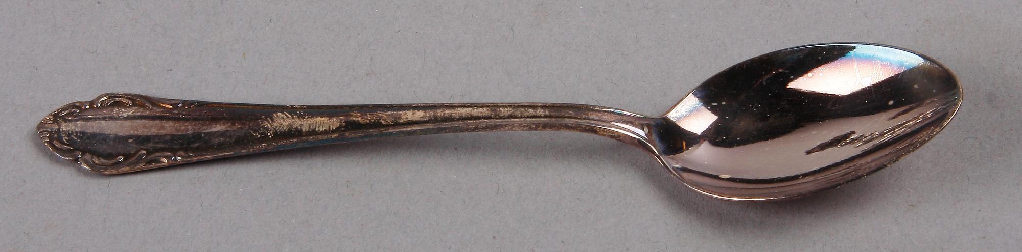 LJUSSTAKAR SAMT DIVERSE BESTICK, silver, bla CG Hallberg, Stockholm 1943.