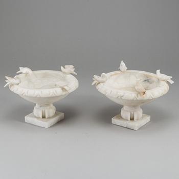 A pair of 20th century alabaster bowls or birdbaths.