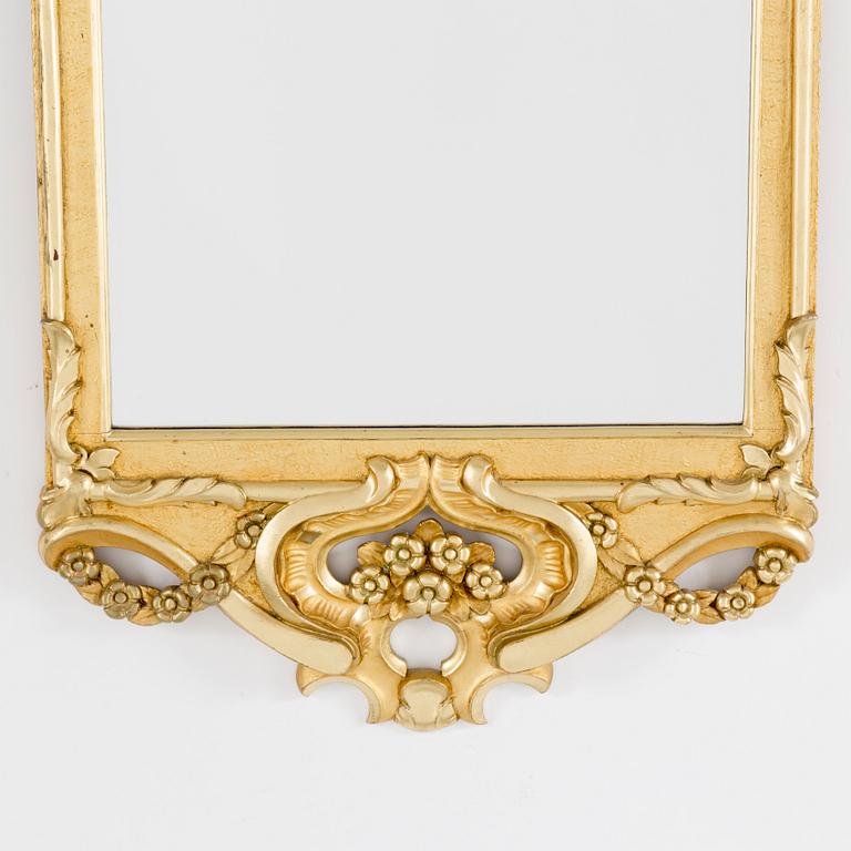 A mid 20th century rococo style mirror.