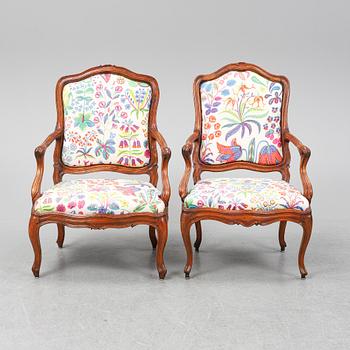 Two 18th century French Louis XV walnut armchairs.