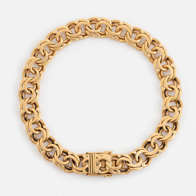 18K gold bracelet.