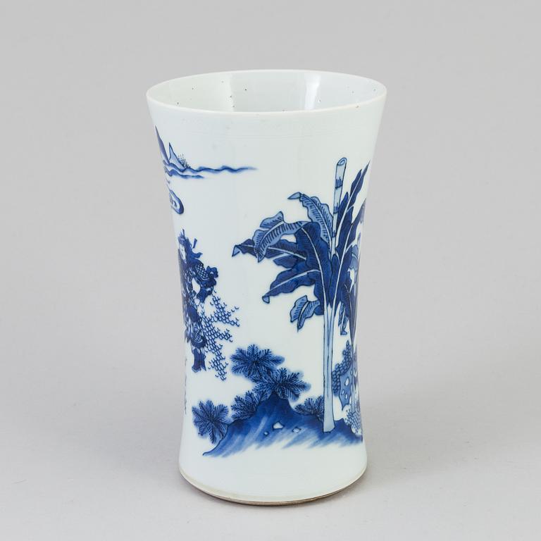 A blue and white vase, Transition style, second half of 20th Century. A cup with stand, Qing dynasty, 18th Century.