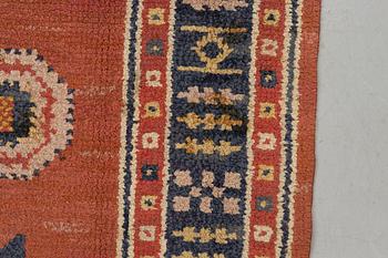 Märta Måås-Fjetterström, a carpet, "Röd Flossa", knotted pile, ca 300 x 272 cm, signed AB MMF.