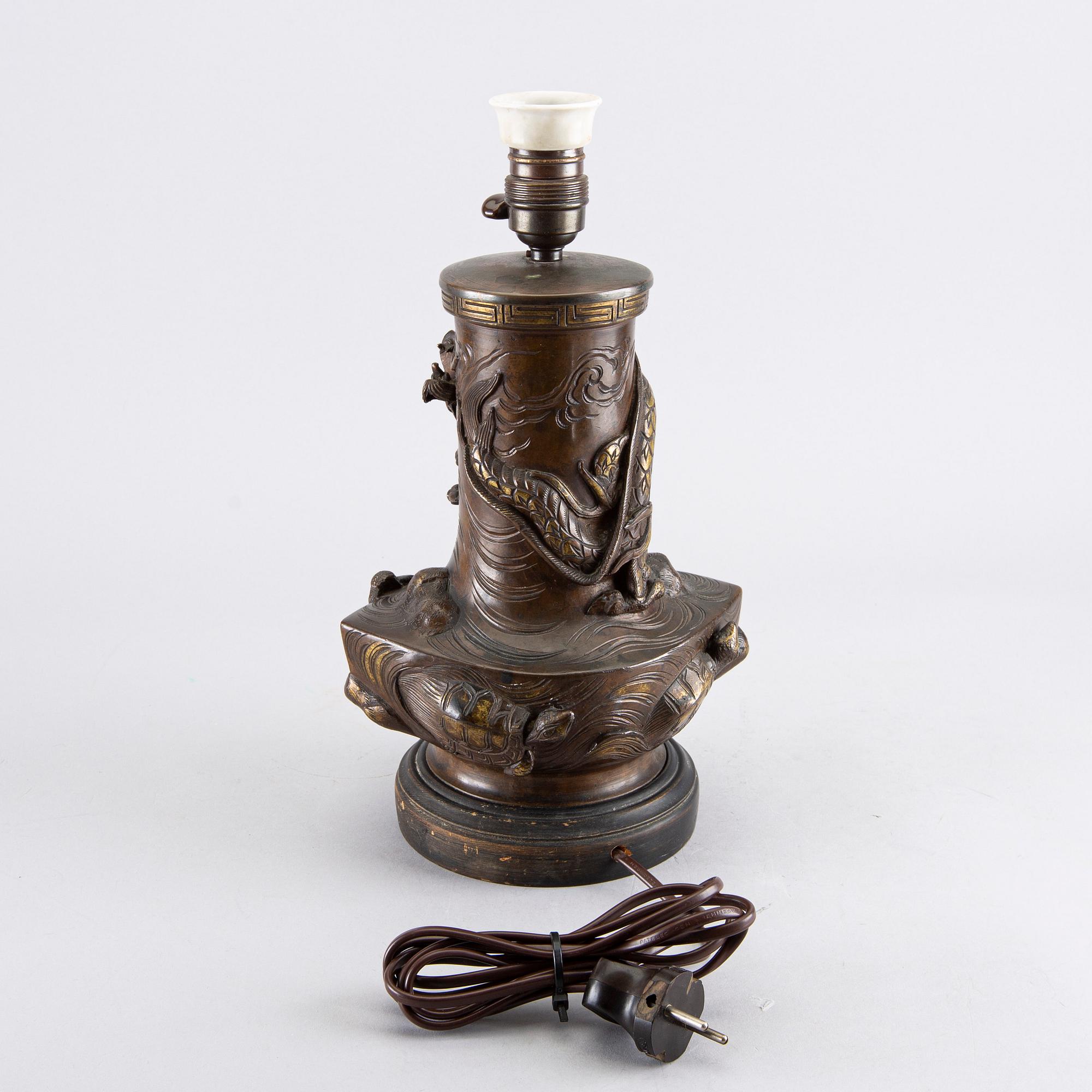 An early 1900's Japanese bronze table lamp.