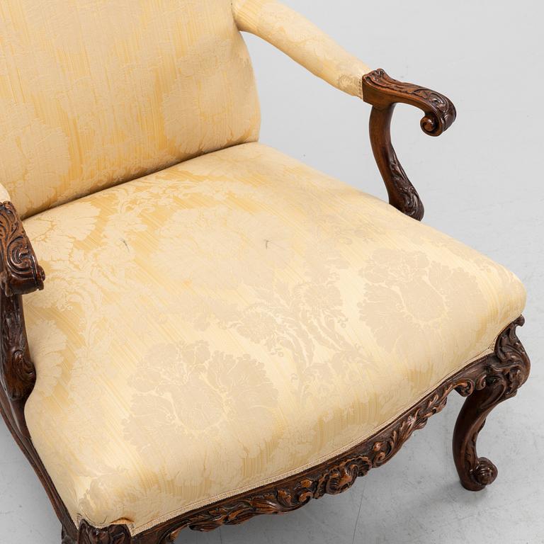 A carved mahogany George II armchair, 18th Century.