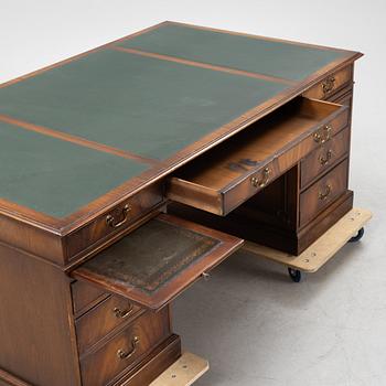 A 20th century Bevan Funnell Ltd Reprodux desk, England.