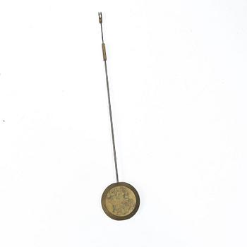 A French Charles X ormolu and patinated bronze mantel clock, ca 1820's.