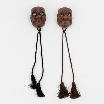 Masker, två stycken, trä. Japan, Meiji (1868-1912).