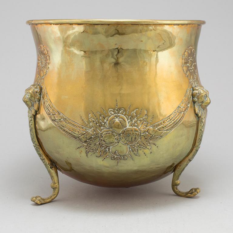 An 18th century brass flower pot.