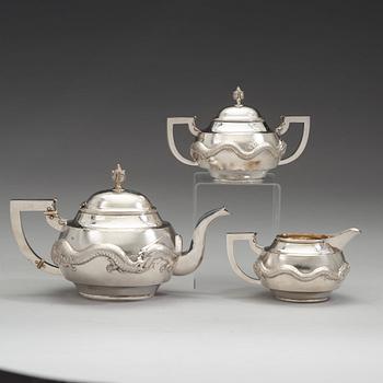 A Chinese three piece silver tea set, early 20th Century.