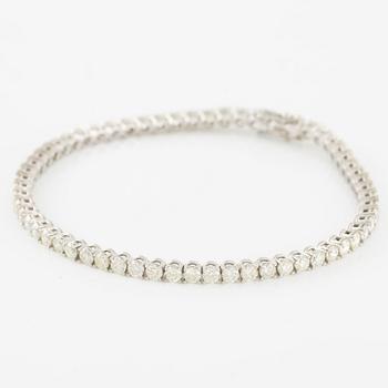 Tennis bracelet 18K white gold with brilliant-cut diamonds.